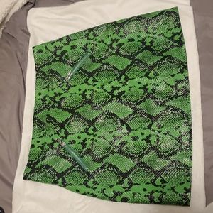 Green and black snake mini skirt